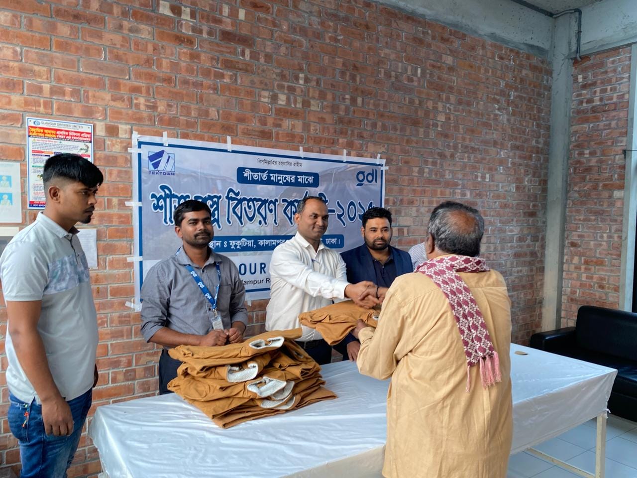 Winter Clothing Distribution Program by Glamour Dresses Limited, a Concern of Textown Group
